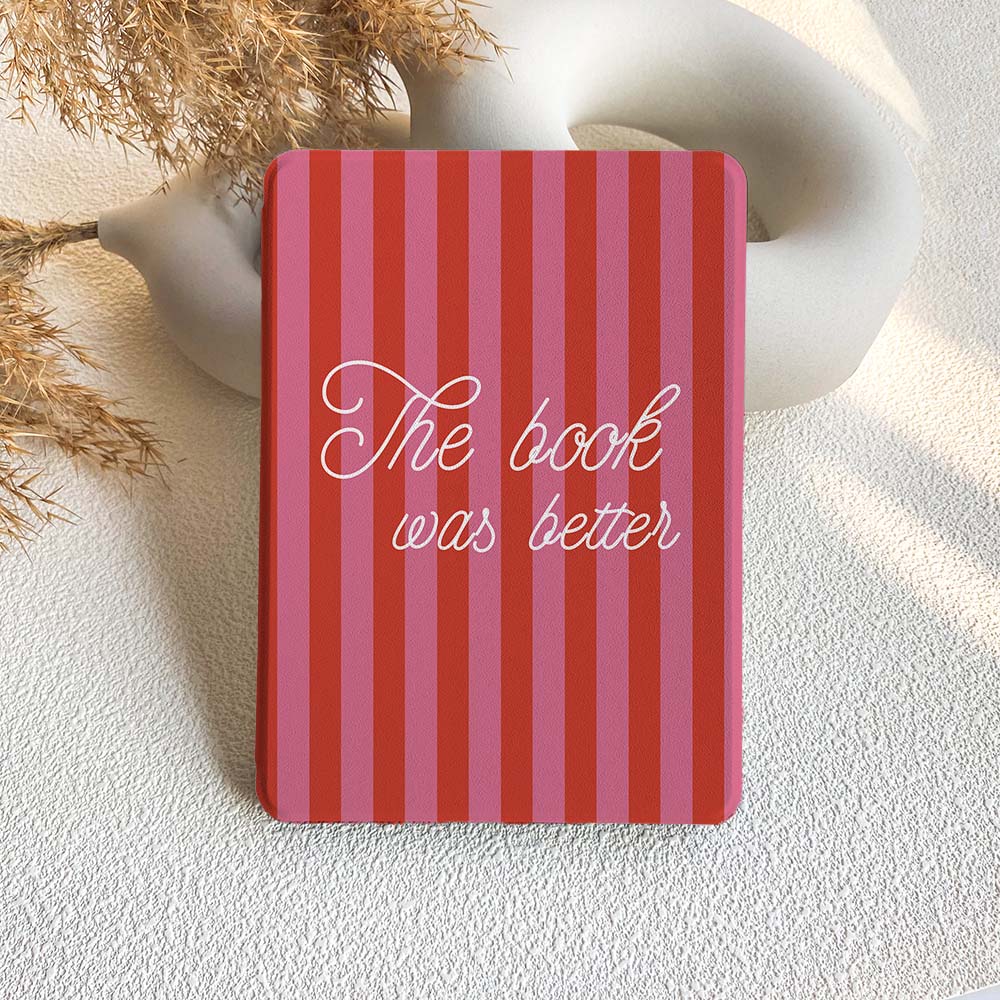 A striped Kindle case in red and pink with the phrase 'The book was better' written on the front.