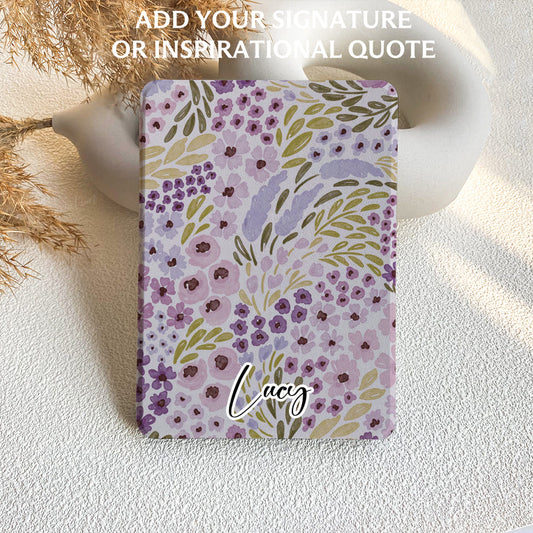 Floral notebook with 'Lucy' on a textured surface