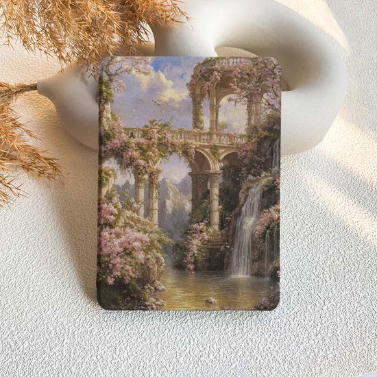 kindle case with a garden scene featuring a waterfall and floral arches on a textured surface.