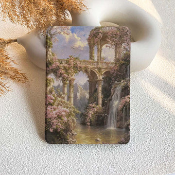 kindle case with a garden scene featuring a waterfall and floral arches on a textured surface.