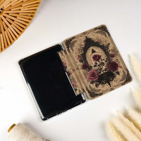 Decorative case with floral design on a tablet on a light surface