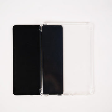 Two black tablets with a silver stand on a white background