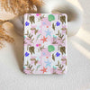 Notebook with floral pattern on a light background