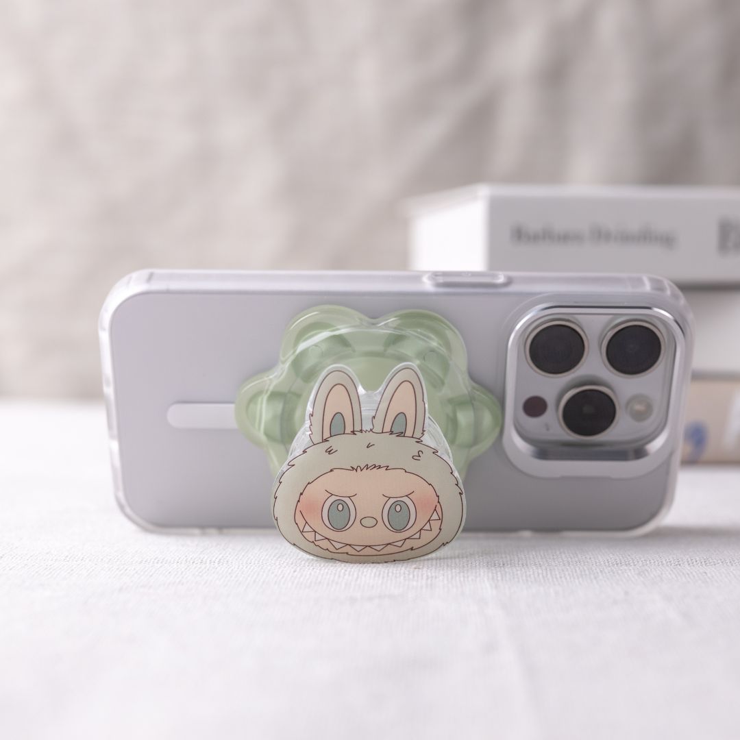 Phone case with a cute animal design on a white surface