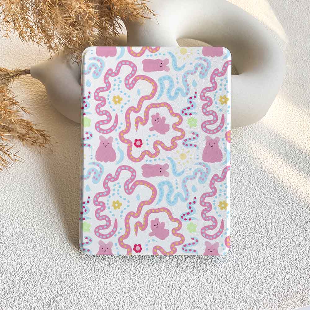 Notebook with pink octopus pattern on a textured surface