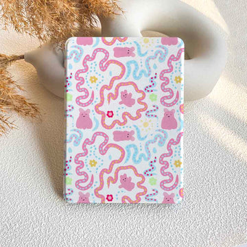 Notebook with pink octopus pattern on a textured surface