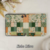 Floral patchwork case for Kobo Libra on a textured surface with flowers in the background