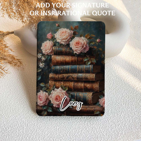 kindle case with vintage books and roses on a textured surface