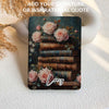 kindle case with vintage books and roses on a textured surface